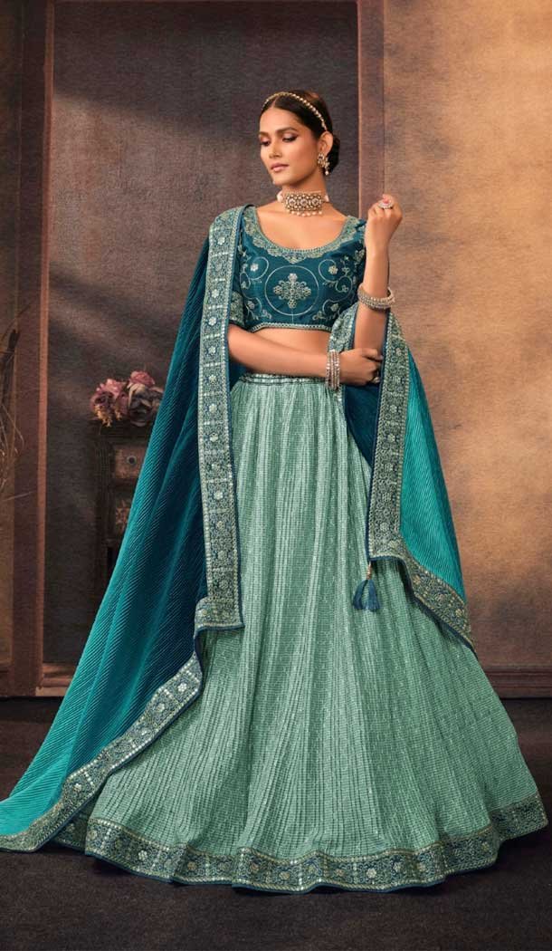 Rama colored party wear designer lehenga choli