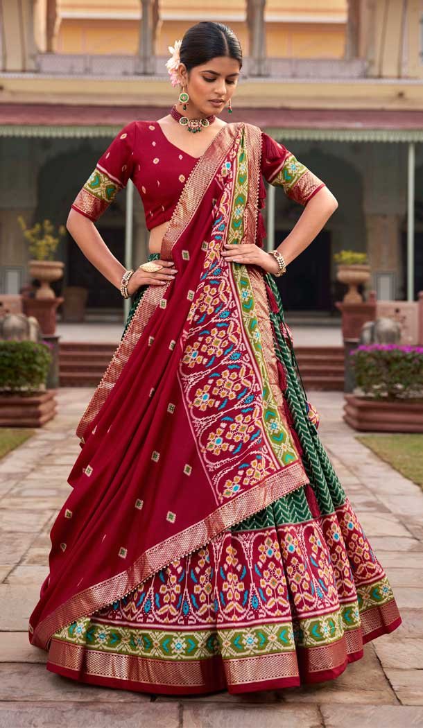 Tussar Silk Patola Work Stunning Navratri Lehenga Choli in Green -9221186298